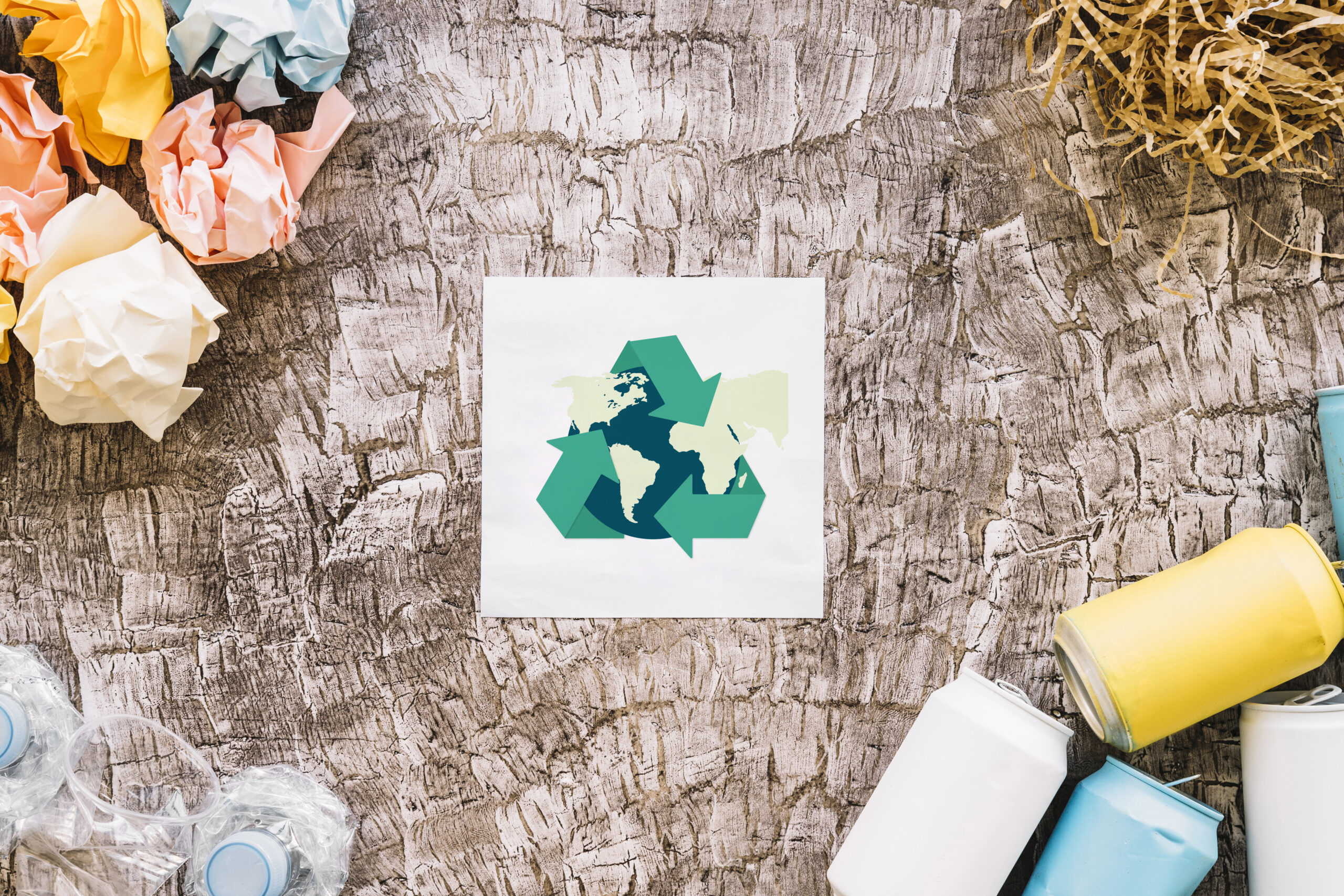 globe-with-recycle-icon-surrounded-by-garbage